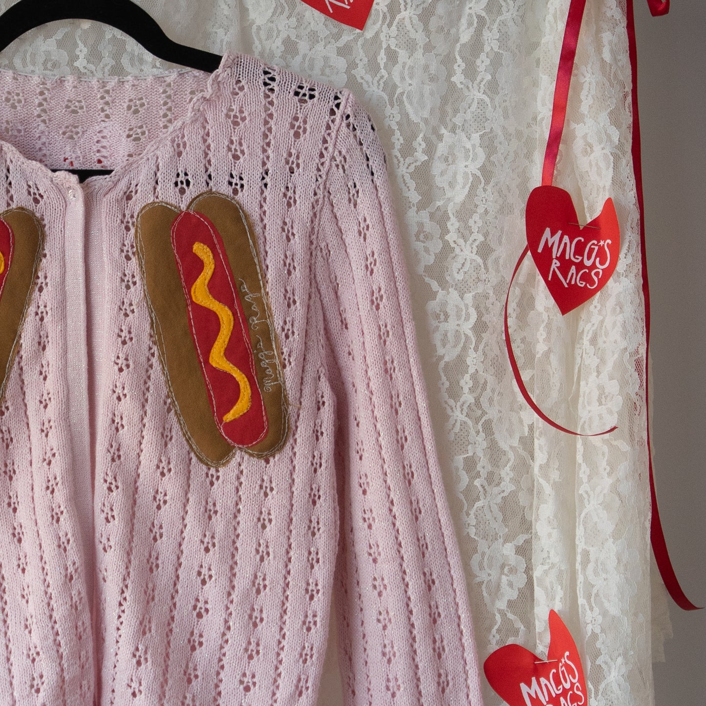 Pink Split front double hotdog sweater(small)