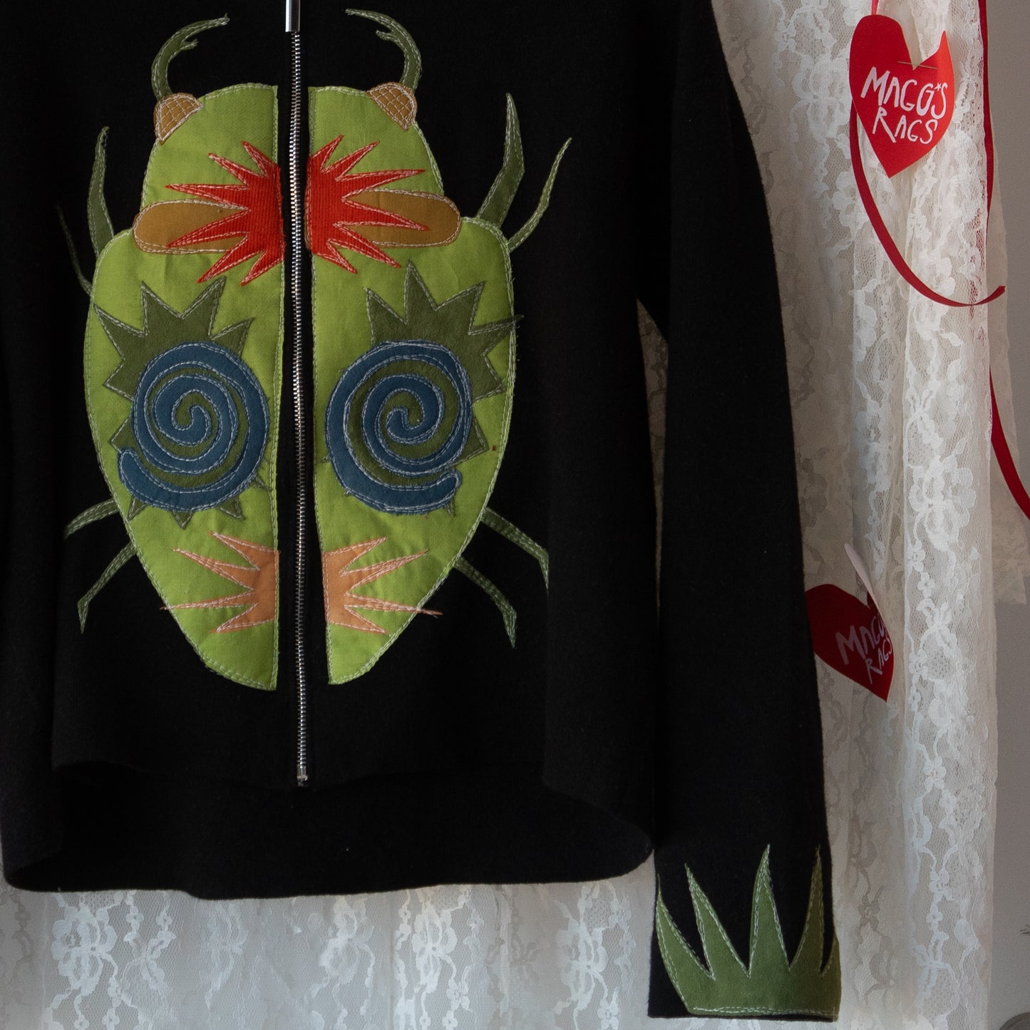 Green mega bug zip-up hooded sweater(medium)