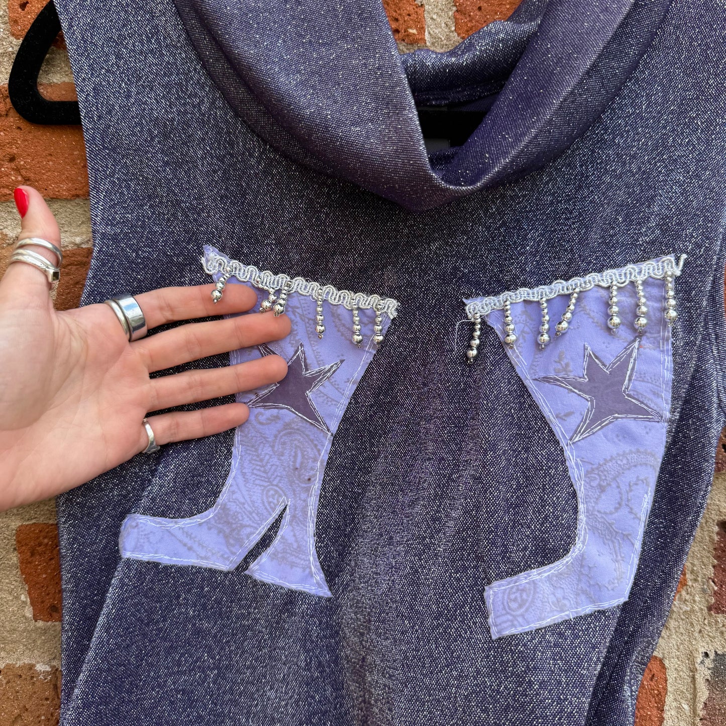 Fringe Boot (•)(•)’s cowl neck tank (medium)