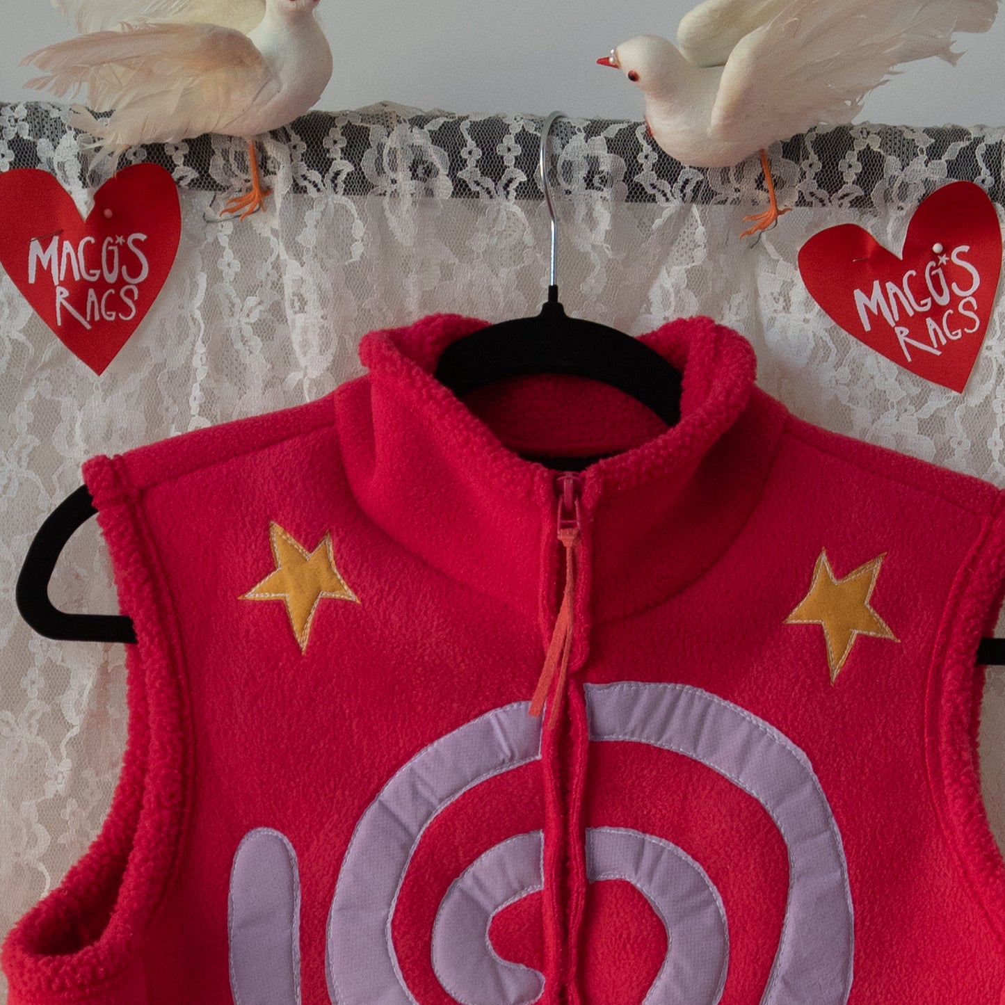 Pink swirls and stars fleece vest(small)