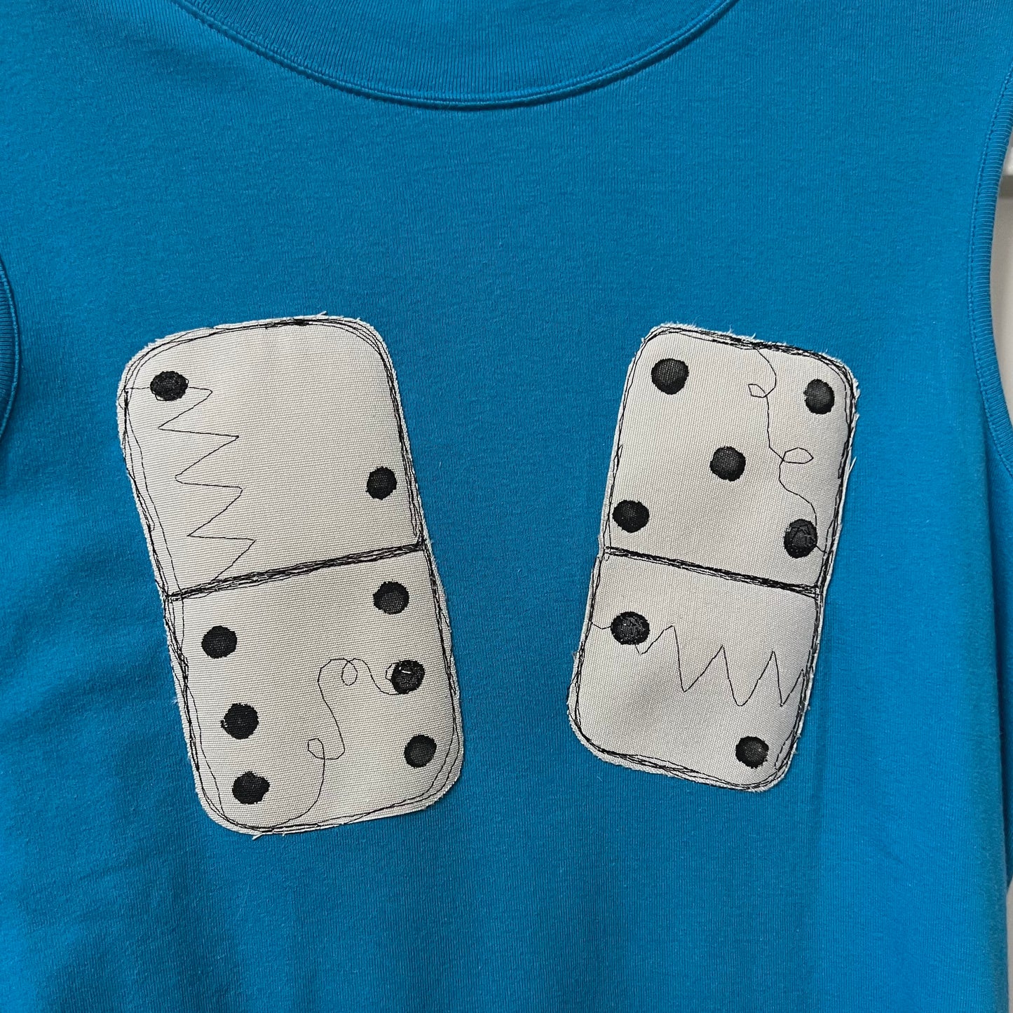 Domino (•)(•)’s (large)