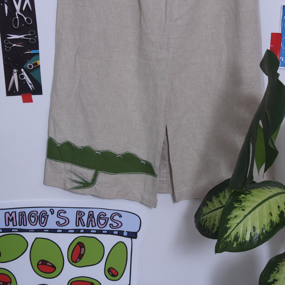 
                      
                        Wrap around gator skirt(medium)
                      
                    