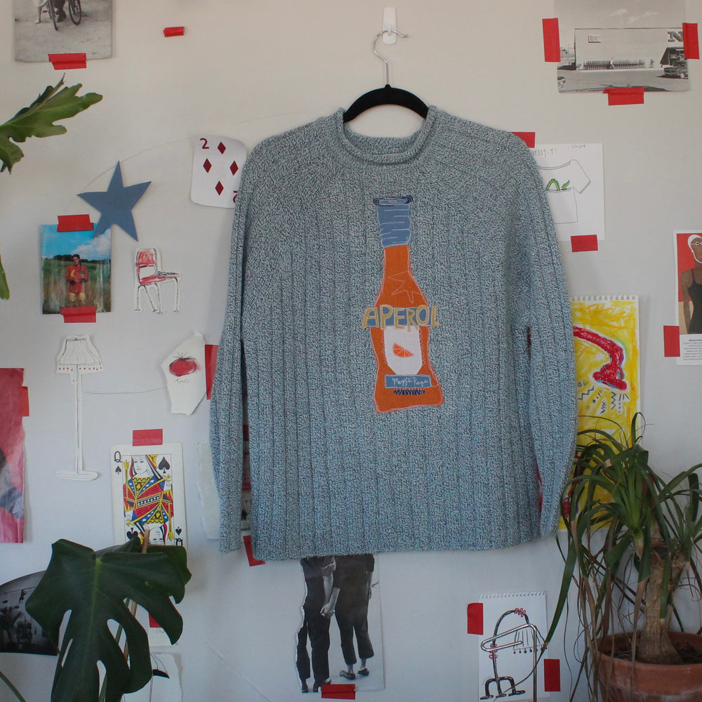 
                      
                        Aperol sweater(medium)
                      
                    