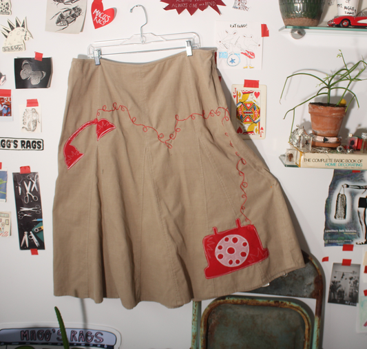 Wrap around telephone skirt(18)