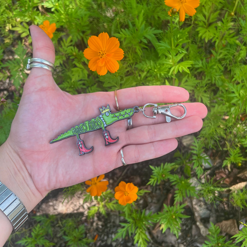 
                      
                        Gator n’ boots keychain
                      
                    