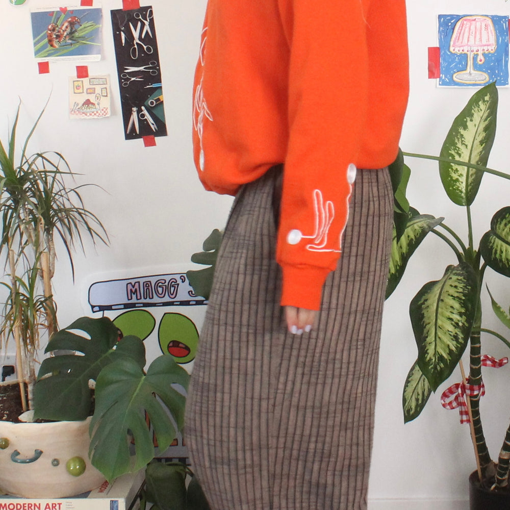 
                      
                        Orange swirly string crew(medium)
                      
                    