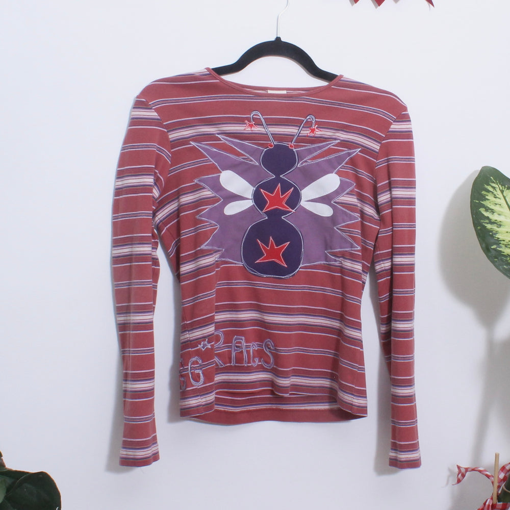 
                      
                        Magg’s Rags bug graphic tee(S/M)
                      
                    