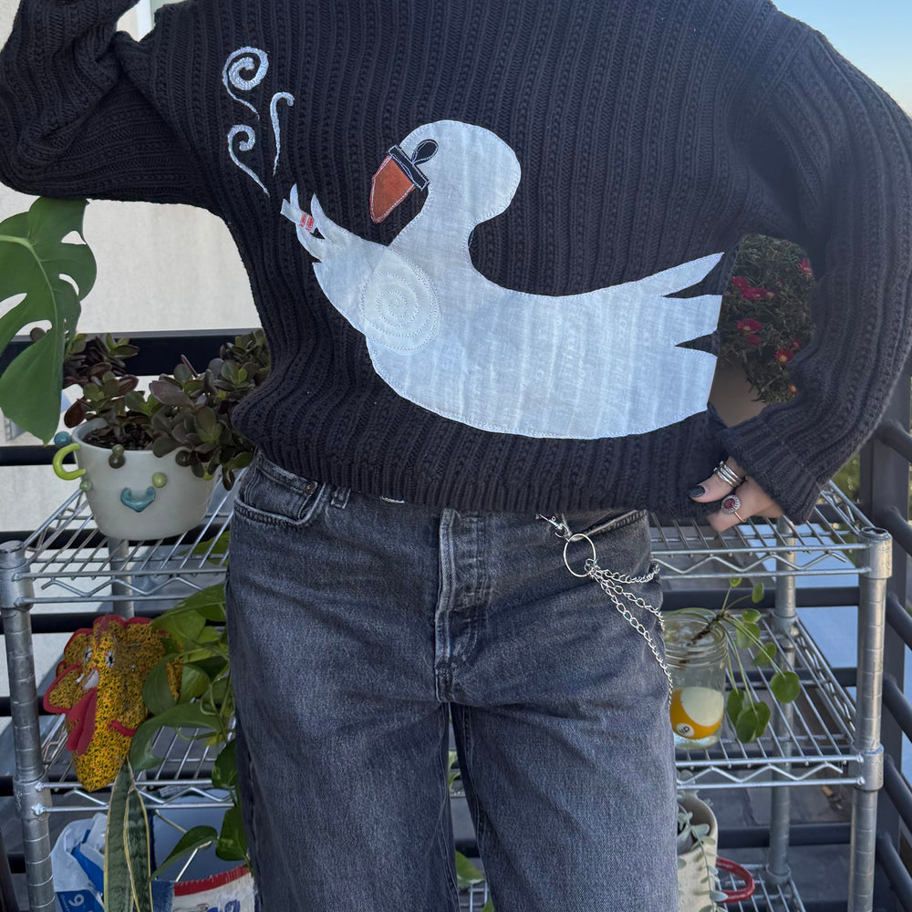 
                      
                        Smoking swan sweater(small)
                      
                    