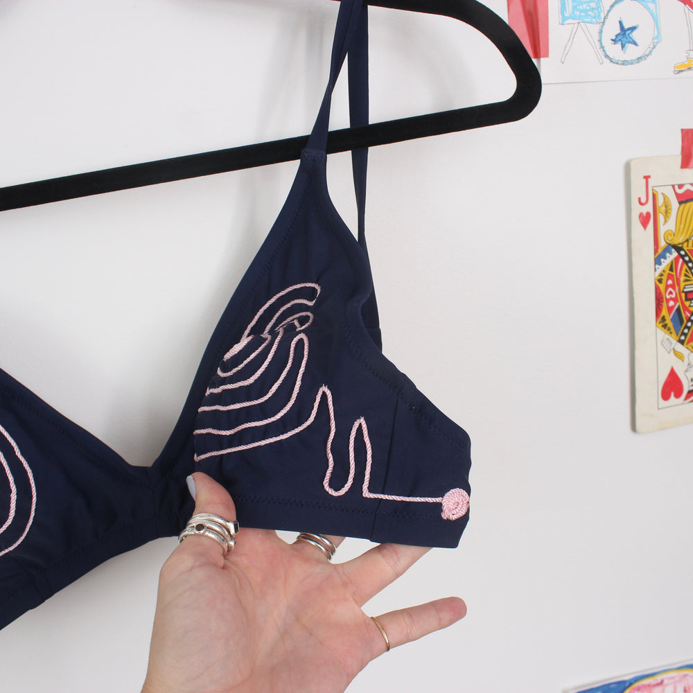 
                      
                        Swirly string bikini(medium)
                      
                    