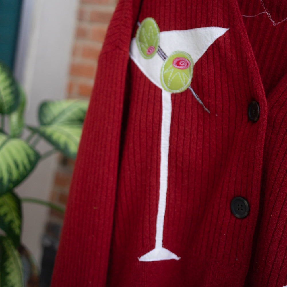 
                      
                        Double martini cardigan
                      
                    