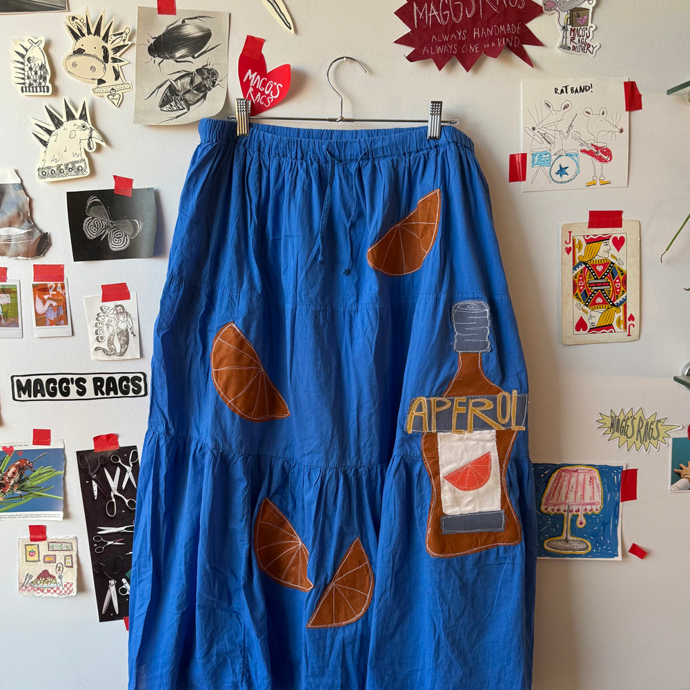 
                      
                        All over Aperol tiered maxi skirt(XL)
                      
                    