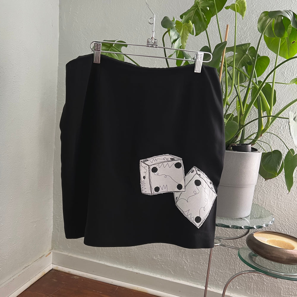 
                      
                        Double Dice Mini Skirt
                      
                    