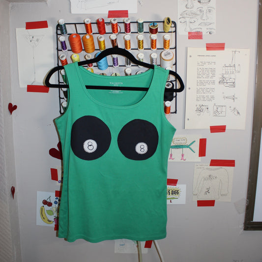 Green 8 ball (•)(•)’s