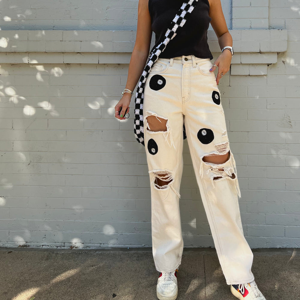 
                      
                        8-ball cream trousers
                      
                    
