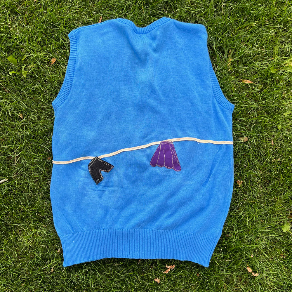 
                      
                        Clothesline Sweater Vest
                      
                    