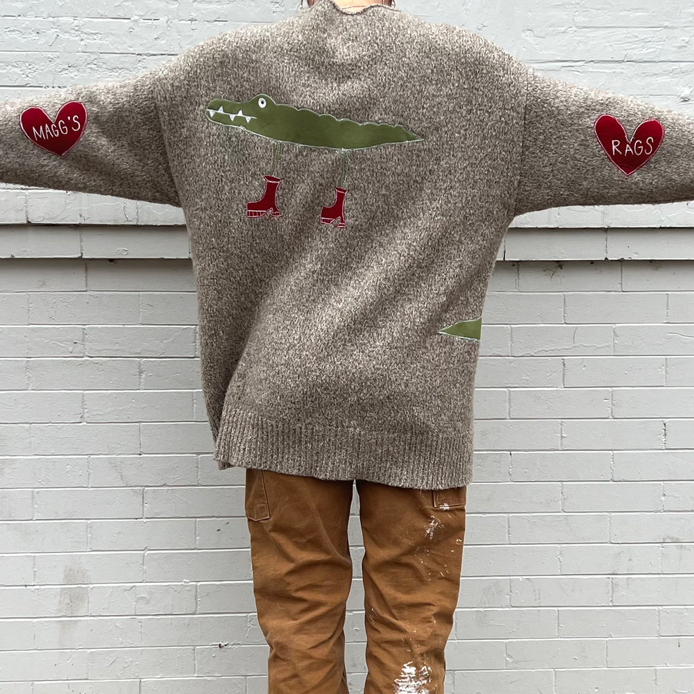 
                      
                        Triple Gator Sweater
                      
                    