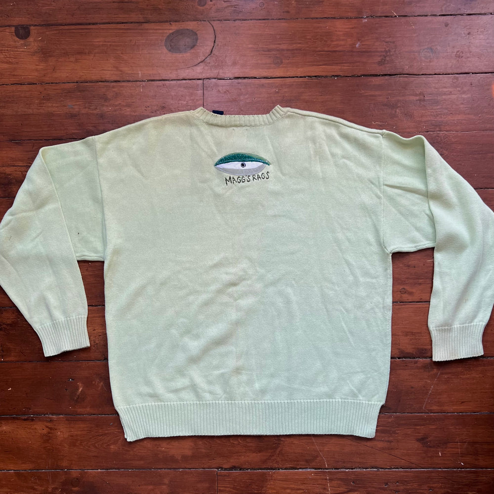 
                      
                        Green eyeball sweater
                      
                    