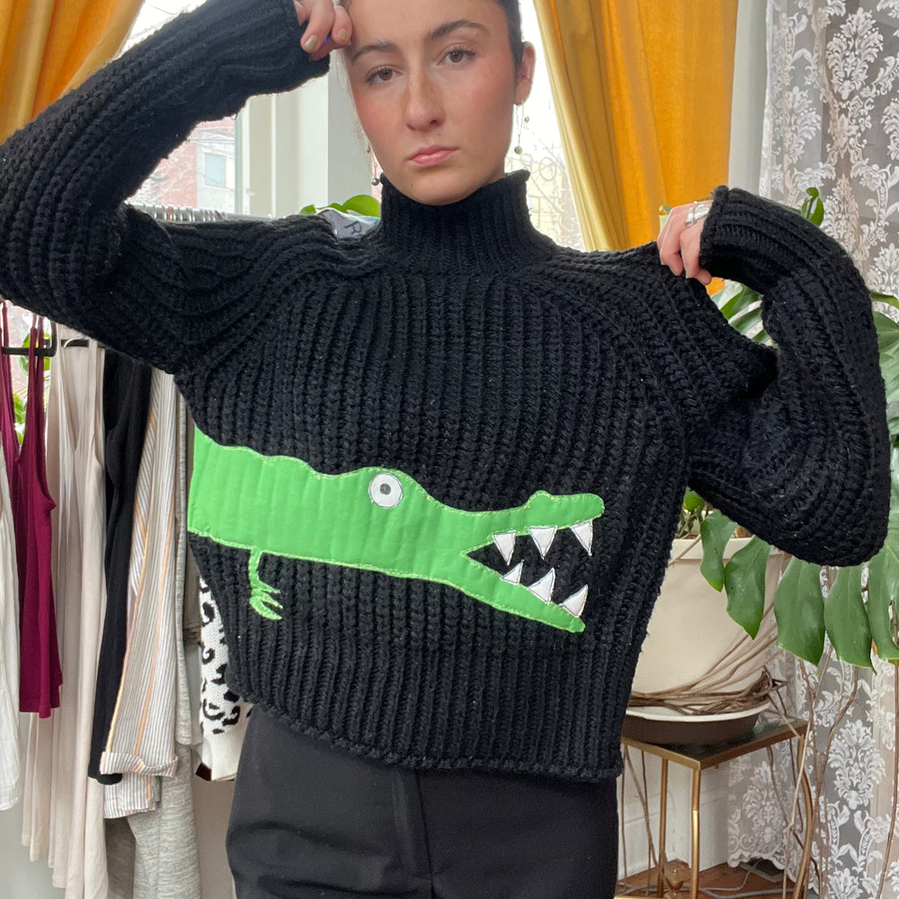 
                      
                        Gator turtleneck
                      
                    
