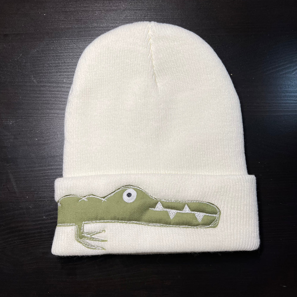 
                      
                        White gator beanie
                      
                    