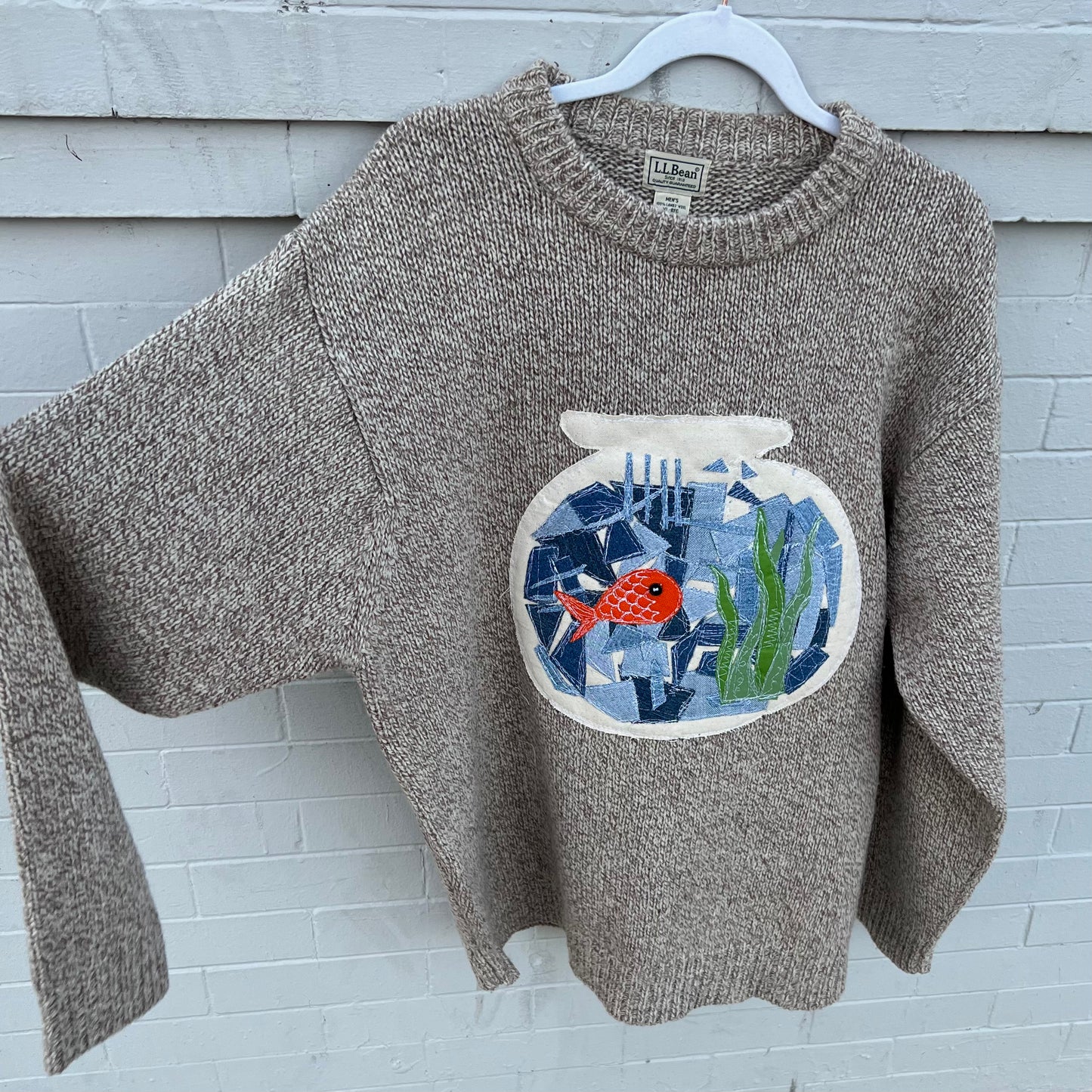 Fish bowl knit sweater